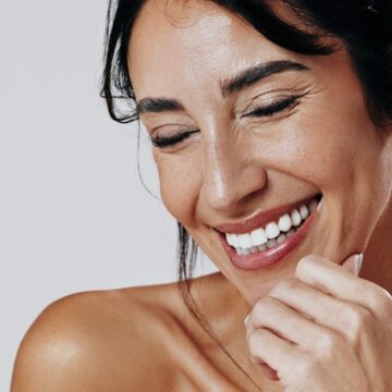 Skincare,,Laugh,Or,Woman,In,Studio,With,Smooth,Skin,,Shine Why Your Glow Deserves a Membership | The Secret to Hot Girl Skin All Year Long